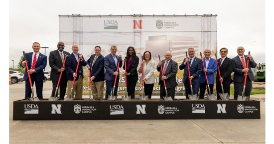 Federal, state and university leaders launched construction of the USDA's National Center for Resilient and Regenerative Precision Agriculture with a May 6 groundbreaking at Nebraska Innovation Campus. Pictured (from left) is Chris Kabourek, interim president of the University of Nebraska system; Rodney D. Bennett, chancellor, University of Nebraska–Lincoln; U.S. Sen. Pete Ricketts; U.S. Rep. Mike Flood; Nebraska Gov. Jim Pillen; Chavonda Jacobs-Young, under secretary for research, education and economics and chief scientist for the USDA; U.S. Sen. Deb Fischer; Paul Kenney, University of Nebraska regent; U.S. Rep. Don Bacon; Jack Stark, University of Nebraska regent; Simon Liu, USDA-ARS administrator; and Mike Boehem, vice chancellor for UNL’s Institute of Agriculture and Natural Resources. (Craig Chandler/University Communication and Marketing)