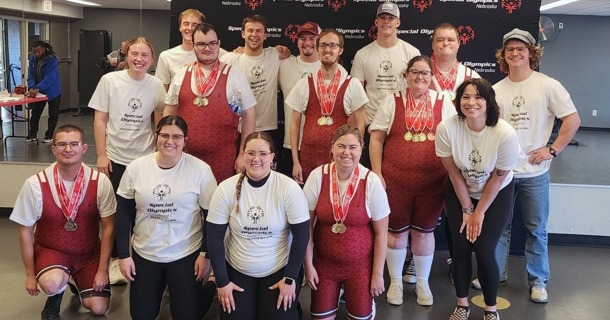 Hastings College student coaches and the Special Olympics powerlifting team. Front (from left): Aaron Bieck, Emma Luna, Morgan Arias, Ella Shaw; Middle (from left): Reagan Bartley, Moyer Reiners, Levi Hoaglund, Sherry Gray, Breanna Jonaitis; Back (from left): Ben Seymour, Marcus Dustin, Brock Buresh, Hudson Devlin, Nick Wahlmeier, Micah Kiehl; Not pictured: Jenna Sterling, Dr. Matthew Beeler