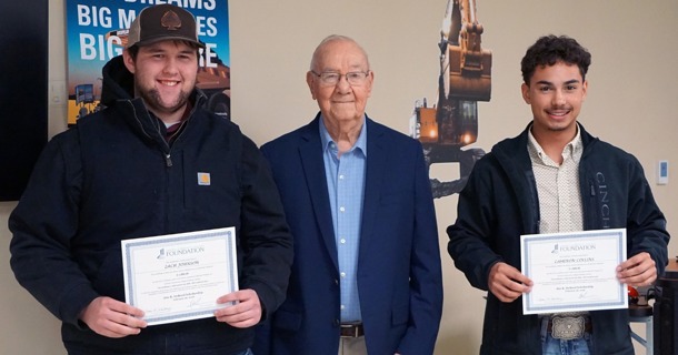 Cutline: The Jim DeBord Scholarship was recently presented to Zach Johnson (left) of Grand Island and Cameron Collins (right) of Lincoln at a ceremony at Central Community College Hastings. Jim DeBord (center), for whom the scholarship is named, posed with the recipients, who each received $1,000 to defray college expenses. (Photo courtesy Central Community College)